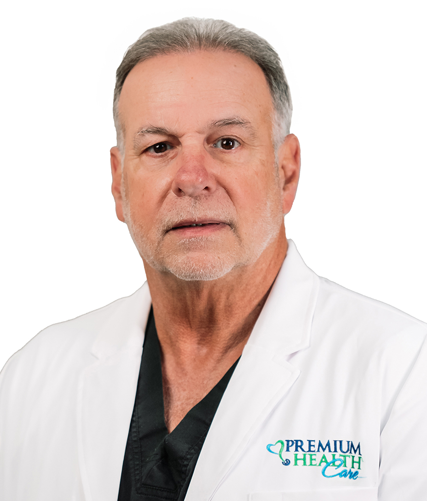 Doctor Onelio Garcia in a white coat staring at the camera.