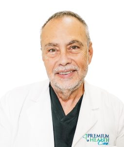 Doctor Rodolfo Perezå in a white coat smiling at the camera.